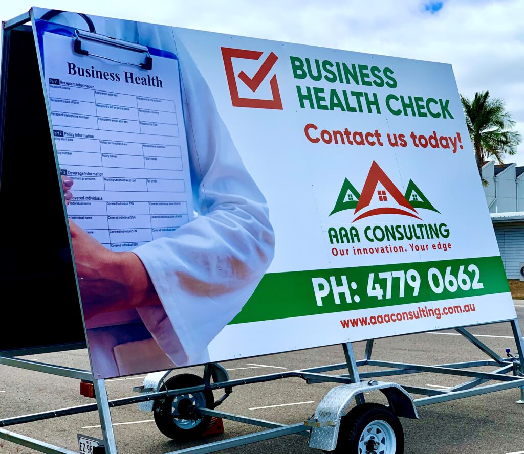 Billboard promoting business health on the side of the road